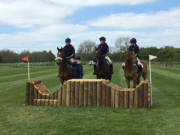 Jack and two other Petplan Equine Ambassadors at a cross country lesson with Lucinda Green