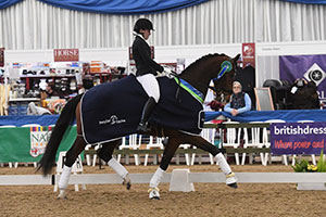 Charlotte Bateman Riding Flores L, winners of the Petplan Equine Area Festival Final