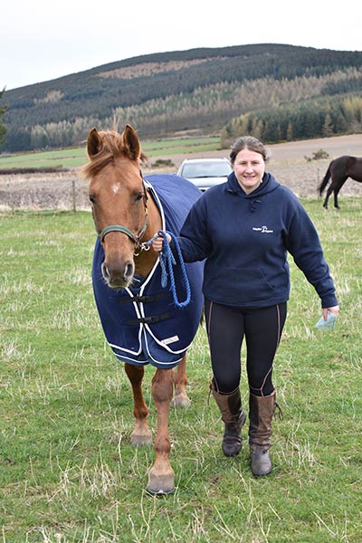 Spangle and Lorna in their branded kit before a ride